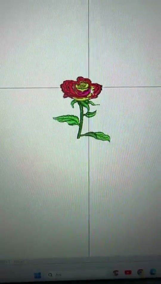 Nakış desen programında kırmızı gül deseninin yakınlaştırılarak incelendiği video